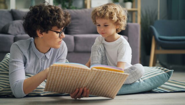 Child practicing speech therapy at home.